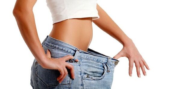 The girl lost weight in the belly area by removing unhealthy foods from her diet. 